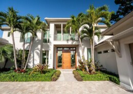 What are the benefits of installing Impact Sliding Doors in Pompano Beach?